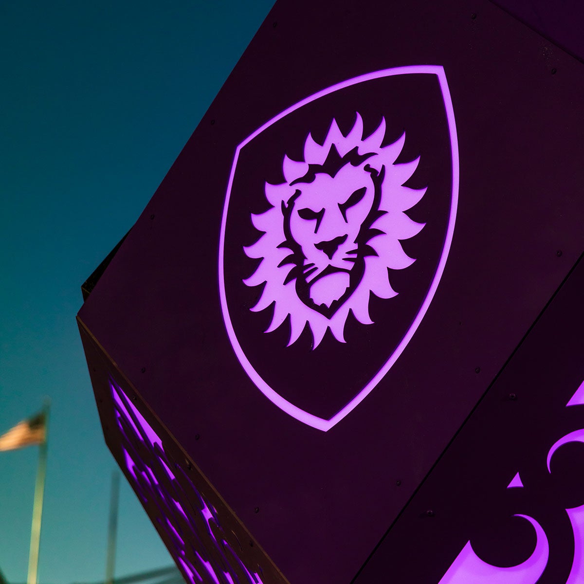 A light up panel on the solar sculpture that features the Orlando City logo.