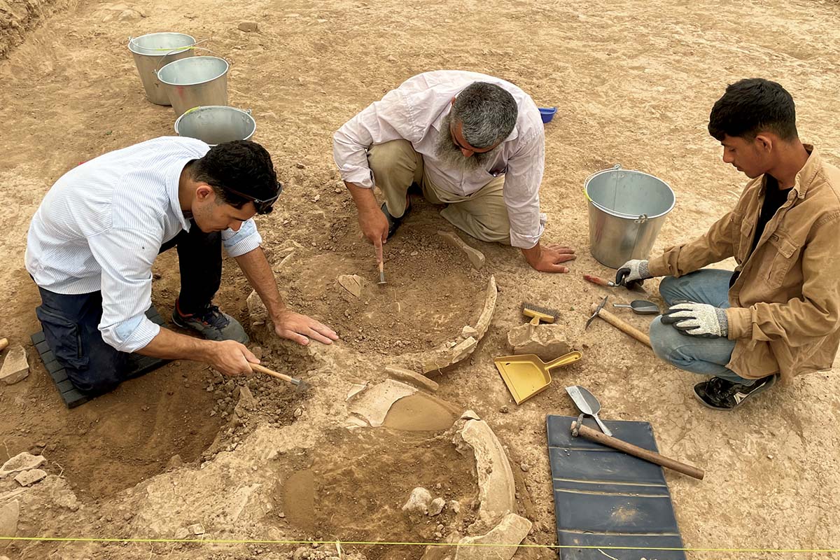 A team of archaeologists excavate an ancient site