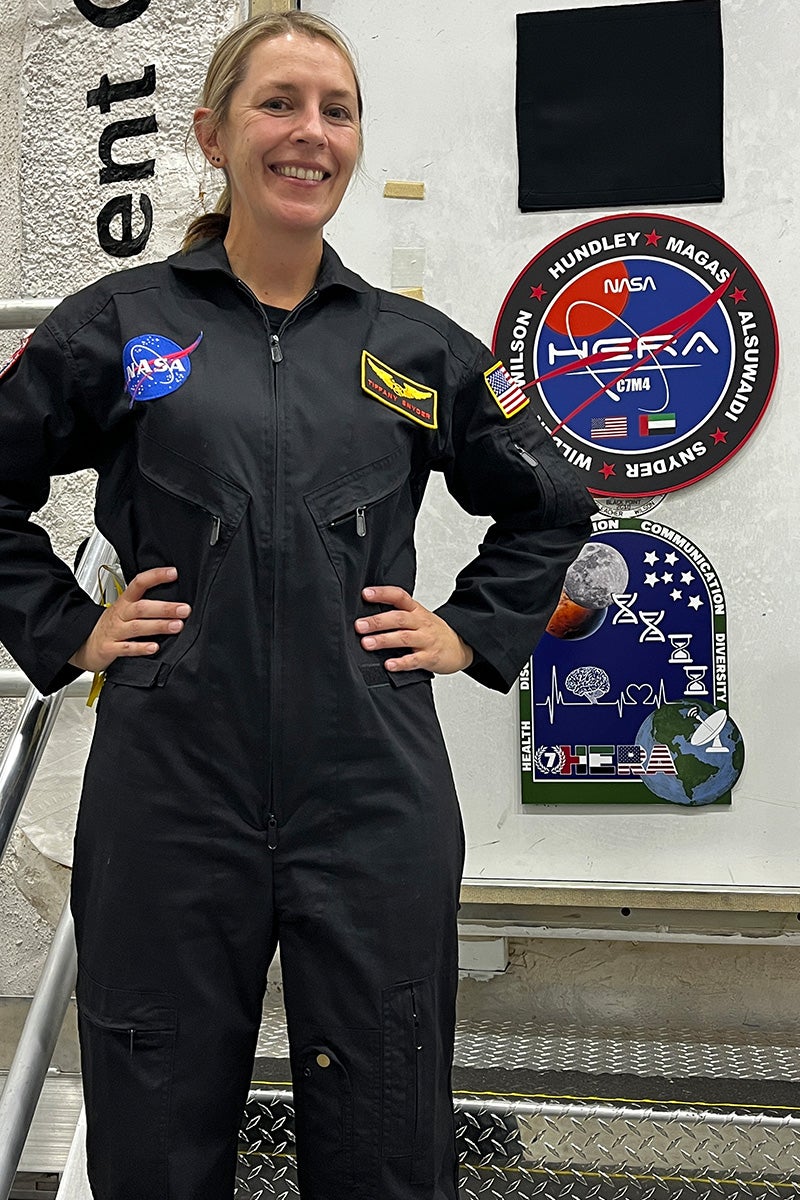 Tiffany Snyder in front of the 65-square-foot habitat HERA.