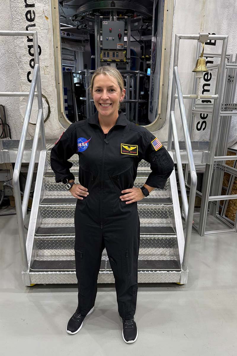 Tiffany Snyder in front of the 65-square-foot habitat HERA.